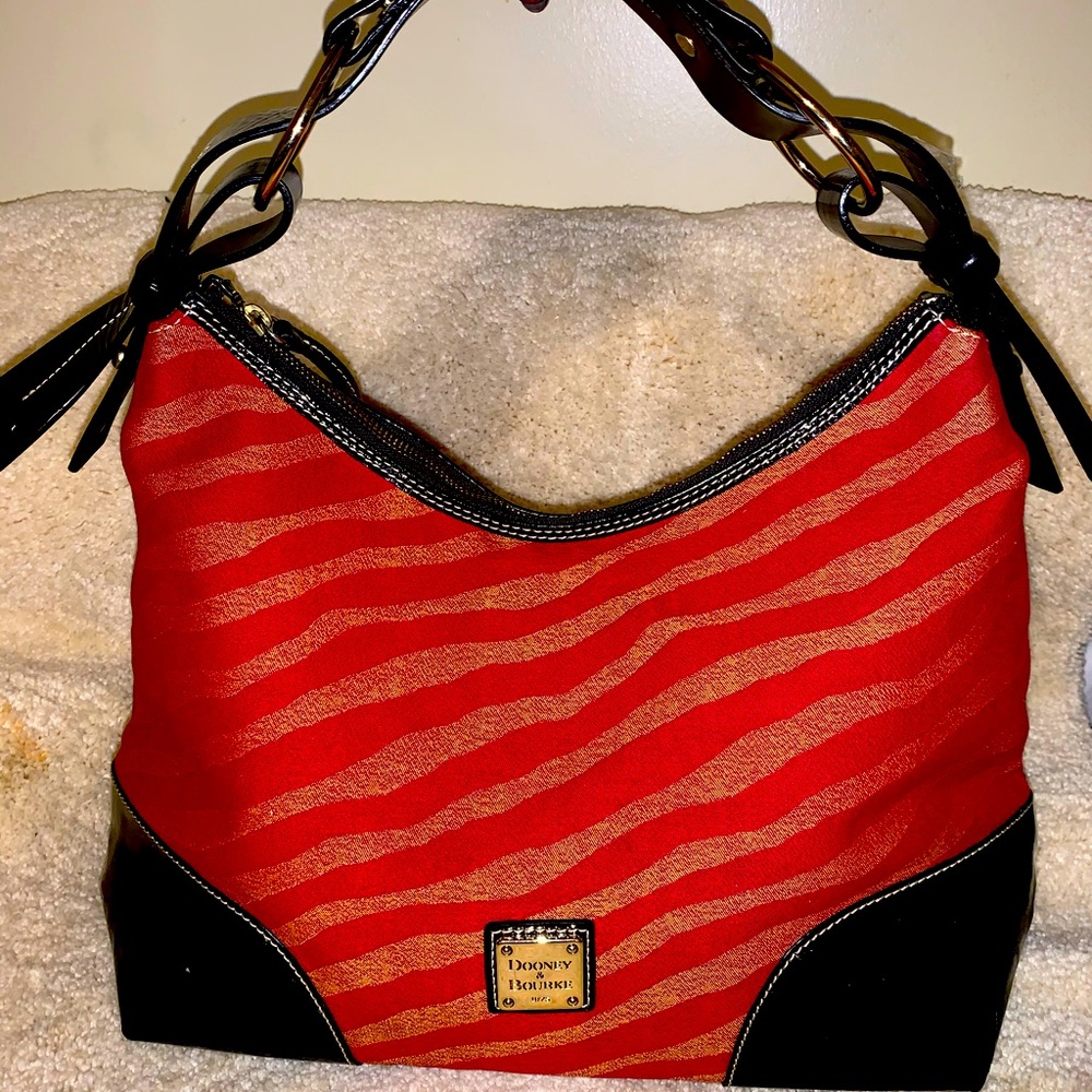 Dooney/zebra pattern! Used with lots of life left!